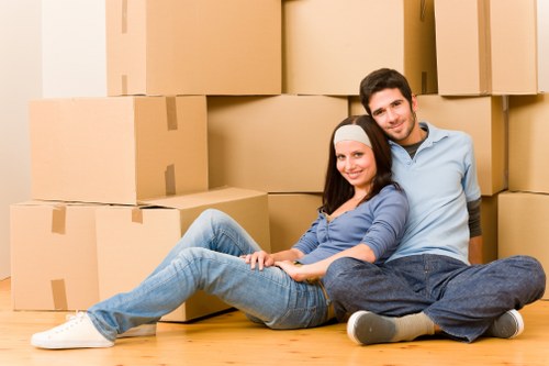 Removal van loading outside a typical Islington flat or townhouse