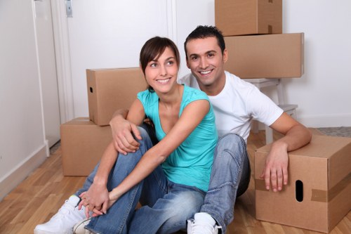 Moving boxes and furniture being loaded by Islington movers in North London