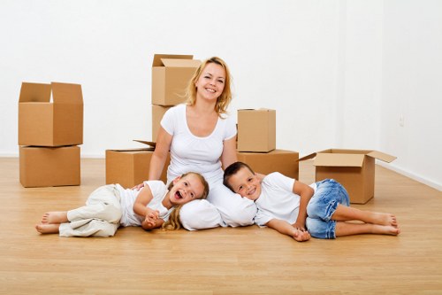 Loading furniture into a van for a move in Islington