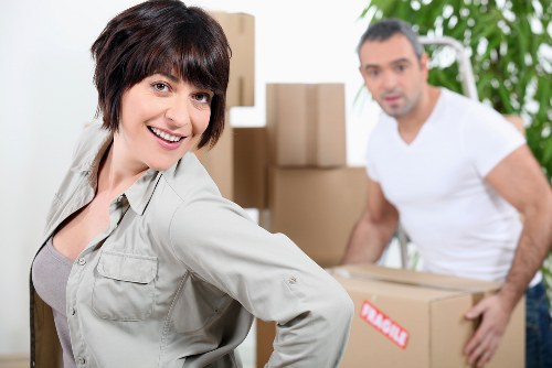 Packing and loading furniture into a moving van in Islington