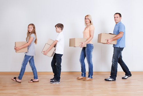 Careful loading of sofas and tables for a local move in Islington