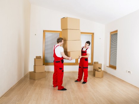 Professional Islington removal team planning a relocation in a narrow street